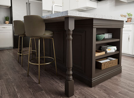 Bright and inviting kitchen featuring decorative millwork, exposed beams, and modern pendant lights, highlighting a stylish blend of rustic and contemporary design elements.